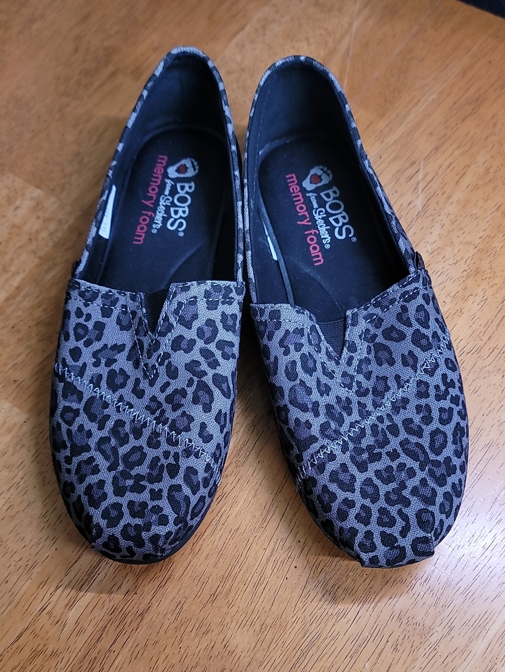 BOBS from Skechers Leopard Print Slip-On Flats in Black and Gray